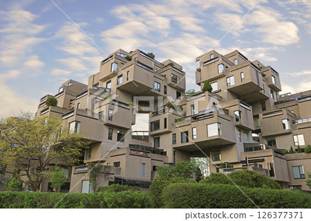 View of Habitat 67, a housing complex consisting of cubes, built at Cite du Havre along the St Lawrence River by Moshe Safdie View of Habitat 67, a housing complex consisting of cubes, built at Cite du Havre along the St Lawrence River by Moshe Safdie 126377371