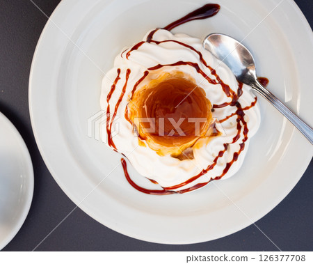 Image of Flan with cream 126377708