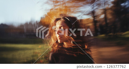 Vibrant Energy: A Group of 23 Year Old Students Enjoying Music with Motion Blur Effect. Generated image 126377762