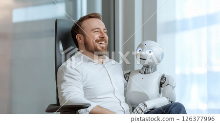 Happy Office Worker Collaborating with Robot Assistant on Tasks. Generated image Happy Office Worker Collaborating with Robot Assistant on Tasks. Generated image 126377996