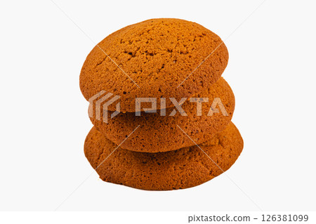 Freshly baked ginger cookies stacked for a sweet treat 126381099