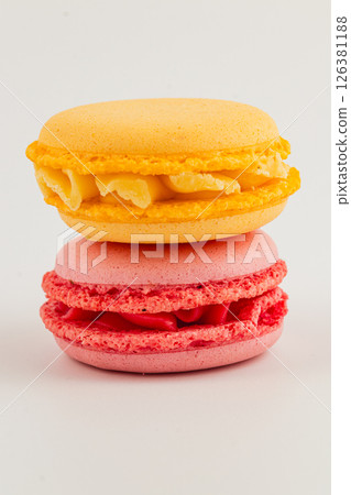 Colorful macarons stacked with vibrant flavors and textures Colorful macarons stacked with vibrant flavors and textures 126381188