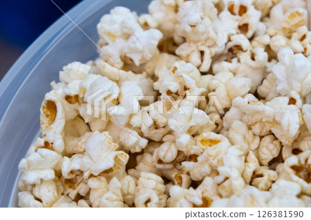 Close-up view of popcorn, for food-related contents, snacks, or movie night 126381590