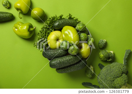 Set of protein vegetables on green background, top view 126381779