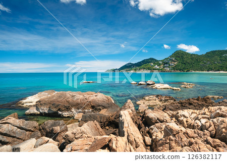 Tropical beach and sea with fresh summer sky on Koh Samui. Beach chairs and umbrellas. Seaside vacation. Summer getaway. 126382117