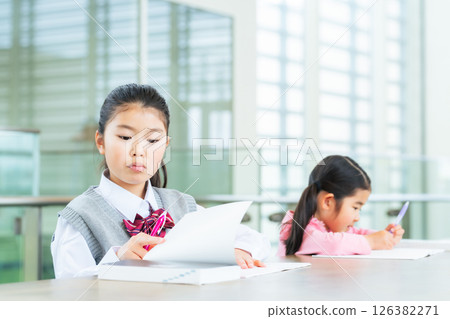 Children studying in a learning facility Children studying in a learning facility 126382271