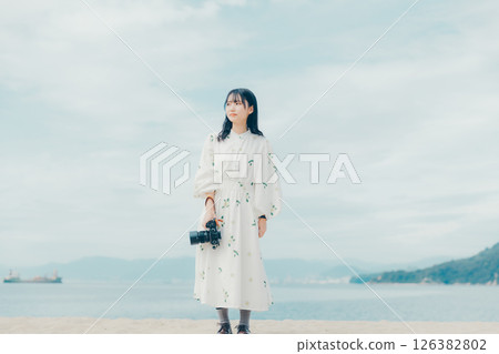 The moment you release the shutter, along with a serene landscape 126382802