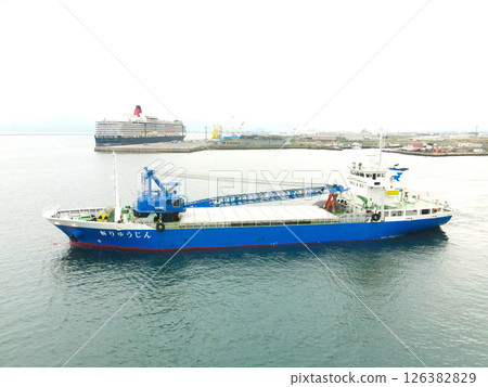 Aerial view of cargo ships leaving Hakodate Port in Hakodate, Hokkaido in spring Aerial view of cargo ships leaving Hakodate Port in Hakodate, Hokkaido in spring 126382829