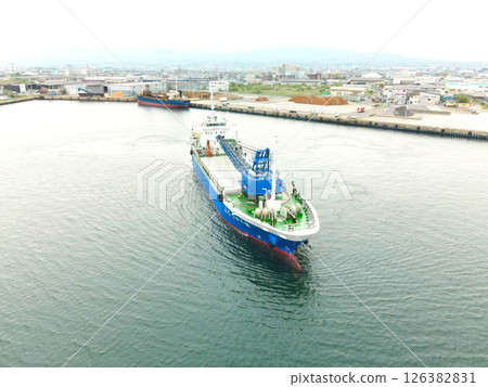 Aerial view of cargo ships leaving Hakodate Port in Hakodate, Hokkaido in spring Aerial view of cargo ships leaving Hakodate Port in Hakodate, Hokkaido in spring 126382831