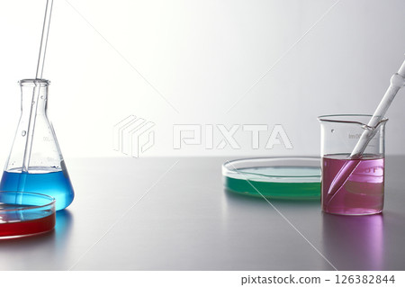 Colorful Laboratory Glassware for Modern Science and Research Background. 126382844