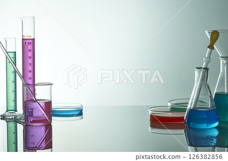 Colorful Laboratory Glassware for Modern Science and Research Background. 126382856