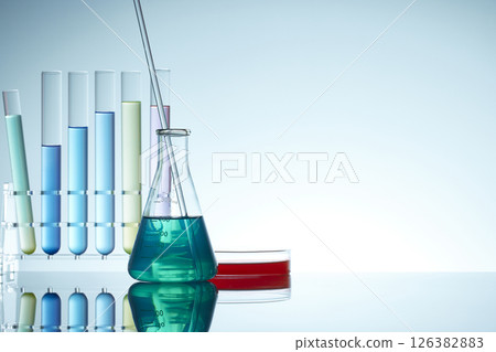 Colorful Laboratory Glassware for Modern Science and Research Background. Colorful Laboratory Glassware for Modern Science and Research Background. 126382883