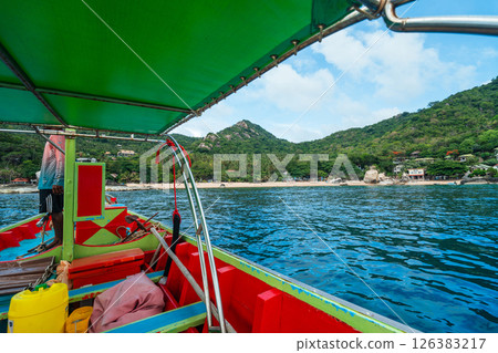 Wooden boat trip to the sea at Koh Tao, snorkeling at the island, summer activities 126383217