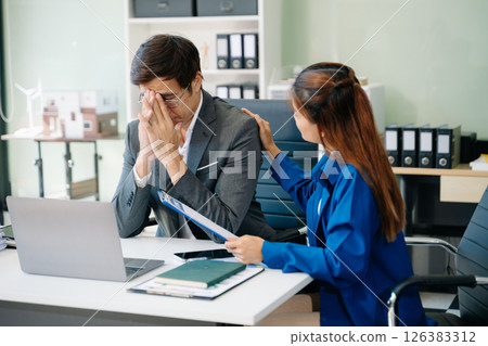 workplace stress and conflict with this intense scene of professionals in a heated office discussio workplace stress and conflict with this intense scene of professionals in a heated office discussio 126383312