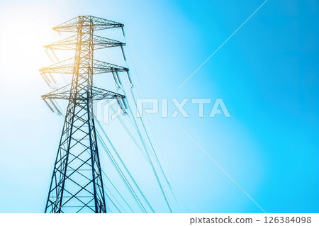 High Voltage Transmission Tower Against Clear Blue Sky. 126384098