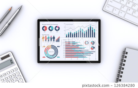 Tablet and business items displaying business data 126384280