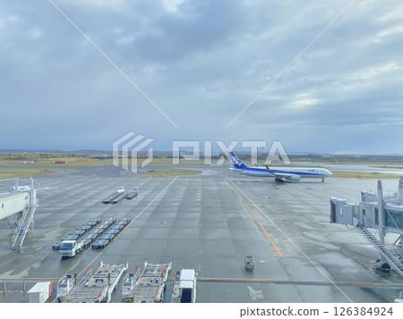 A landscape with an airplane A landscape with an airplane 126384924
