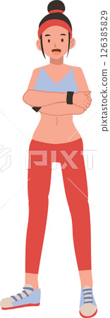 Athletic woman in sportswear posing confidently for fitness motivation and gym training 126385829