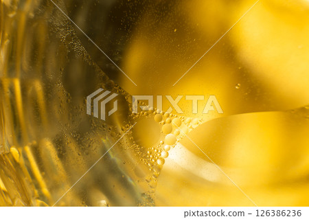 Gold Oil bubbles. circles of orange water macro. abstract yellow background Gold Oil bubbles. circles of orange water macro. abstract yellow background 126386236