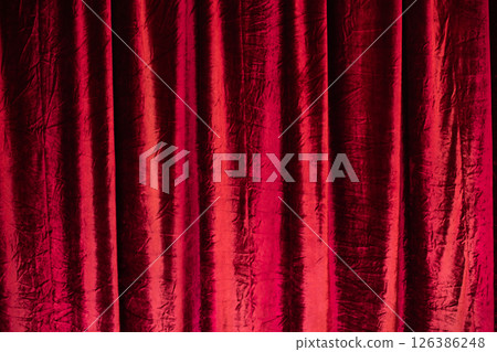 Closed theatre curtain before entertainment presentation or performance. 126386248