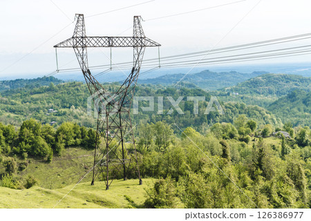 Power Lines Crossing Mountain Landscape in Georgia 126386977