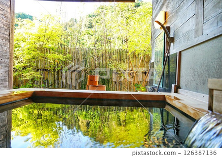An open-air bath with hot spring water An open-air bath with hot spring water 126387136