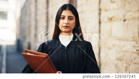 Portrait, lawyer and woman in city, folder and trial report with courtroom schedule. Face, person and attorney with file, documents and legal services with justice constitution and verdict claims Portrait, lawyer and woman in city, folder and trial report with courtroom schedule. Face, person and attorney with file, documents and legal services with justice constitution and verdict claims 126387245