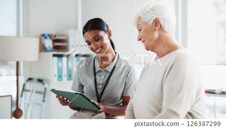 Physiotherapy, tablet and person with senior woman for medical results, consulting and diagnosis. Physical therapy, wellness and patient on digital tech for mobility, treatment and rehabilitation 126387299