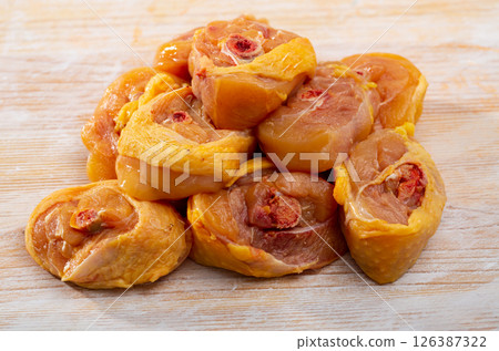 Uncooked sliced transversely chicken legs 126387322