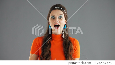 Woman, portrait and shock news in studio, wow reaction or expression with open mouth on gray background. Surprise, announcement or mockup space with revelation, mind blown or positive opportunity Woman, portrait and shock news in studio, wow reaction or expression with open mouth on gray background. Surprise, announcement or mockup space with revelation, mind blown or positive opportunity 126387560