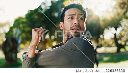 Fitness, exercise and man with stretching at park to start training, cardio performance and getting ready. Runner, athlete and arm warm up in nature for workout, muscle tension relief and wellness Fitness, exercise and man with stretching at park to start training, cardio performance and getting ready. Runner, athlete and arm warm up in nature for workout, muscle tension relief and wellness 126387830
