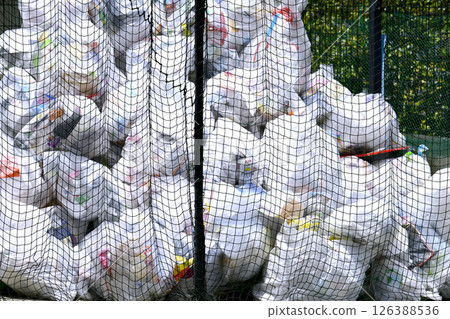 Yokohama cityscape, Japan. Collection day for plastic containers and packaging. Mountains of garbage piled up in the city. Yokohama. Yokohama cityscape, Japan. Collection day for plastic containers and packaging. Mountains of garbage piled up in the city. Yokohama. 126388536