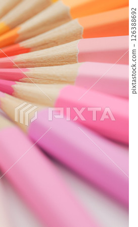 a warm, dreamy palette of pinks, corals, and oranges, with the soft focus enhancing its gentle, almost nostalgic feel. 126388692