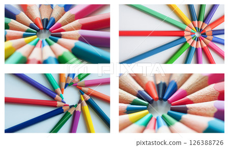 A radial arrangement of colored pencils forms a vivid burst from a central point 126388726