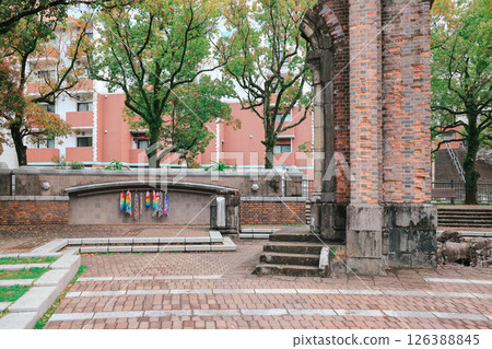 March 28 2025 March 28 2025 Statue in Park Surrounded by Trees and Visitors 126388845