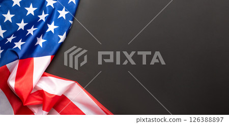 Black background with American flag. Independence day. Website banner and greeting card design template. Black background with American flag. Independence day. Website banner and greeting card design template. 126388897