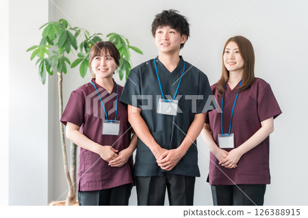 Doctors, doctors and nurses wearing scrubs Doctors, doctors and nurses wearing scrubs 126388915