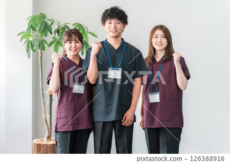 Doctors, doctors and nurses wearing scrubs 126388916
