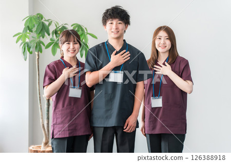 Doctors, doctors and nurses wearing scrubs 126388918