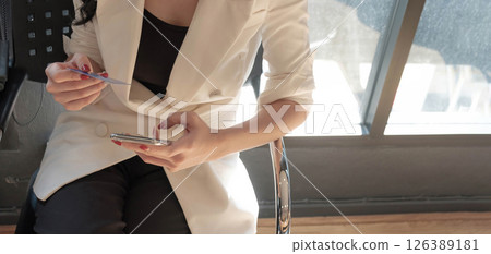 woman asian making online payment on laptop computer with credit card for shopping on onlines retail shop at home woman asian making online payment on laptop computer with credit card for shopping on onlines retail shop at home 126389181