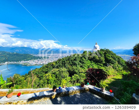 Nepal: World Peace Pagoda on a hill overlooking Lake Fewa and Pokhara 126389409