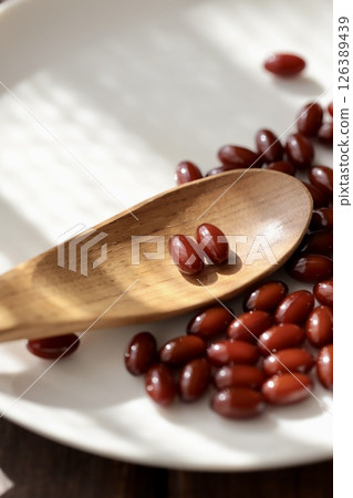 A brown pill supplement that you take two tablets at a time 126389439