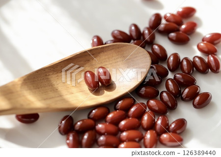 A brown pill supplement that you take two tablets at a time 126389440