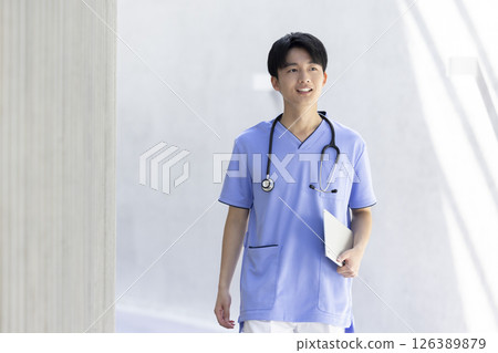 Young doctor working in a hospital 126389879
