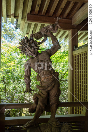 Wooden Oni demon statue at Mitaki-Dera temple in Hiroshima, Japan Wooden Oni demon statue at Mitaki-Dera temple in Hiroshima, Japan 126390650