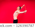 Portrait, happy man and bodybuilder with abs on studio background, backdrop and topless pride 126390787