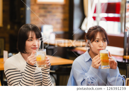 A woman drinking alcohol 126391239