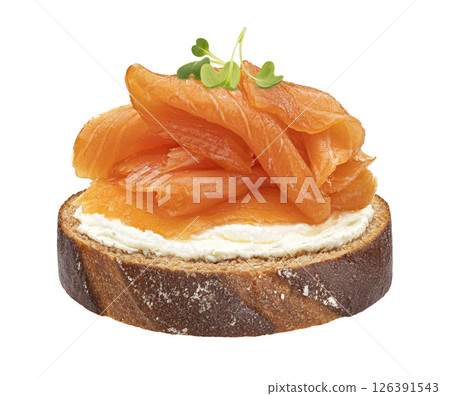 Smoked salmon with cream cheese on rye bread slice isolated on white background with clipping path, package design element Smoked salmon with cream cheese on rye bread slice isolated on white background with clipping path, package design element 126391543