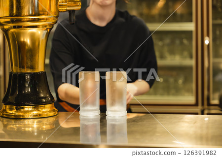 Woman working at a bar 126391982