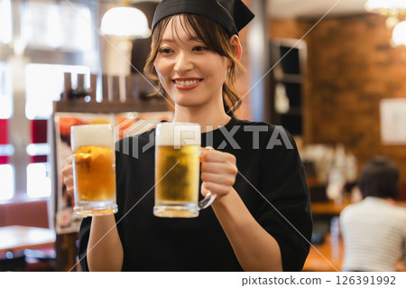 A waiter working at a restaurant A waiter working at a restaurant 126391992